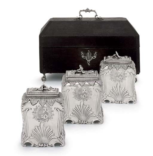 A SET OF THREE GEORGE III SILVER TEA-CADDIES