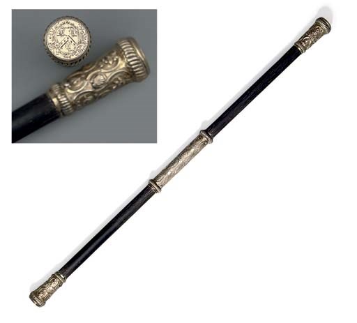 A GEORGE II SILVER-GILT MOUNTED EBONISED BATON