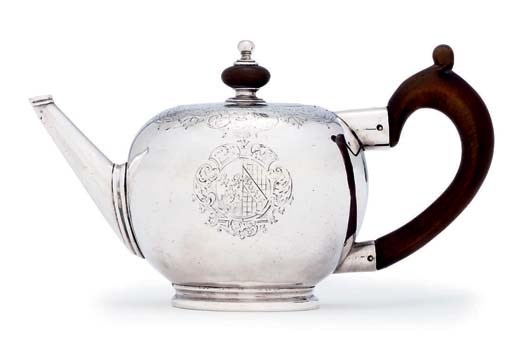A GEORGE I SILVER TEAPOT