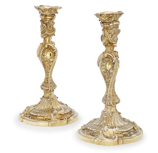 A PAIR OF GEORGE II SILVER-GILT CANDLESTICKS