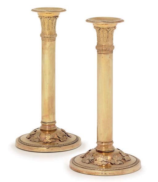 A PAIR OF GERMAN SILVER-GILT CANDLESTICKS