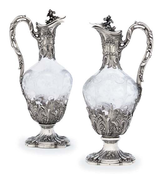 A PAIR OF FRENCH SILVER-MOUNTED ENGRAVED-GLASS CLARET-JUGS