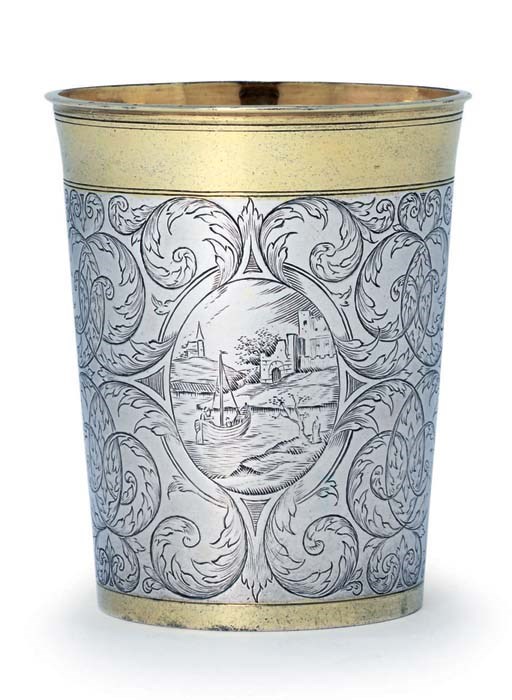 A GERMAN PARCEL-GILT SILVER BEAKER