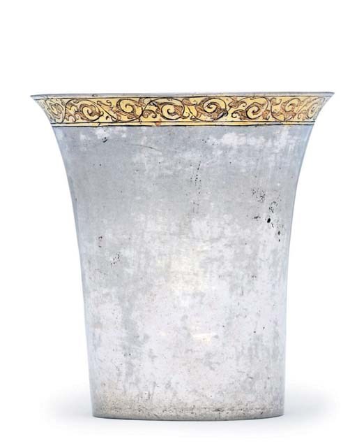A GERMAN PARCEL-GILT SILVER BEAKER