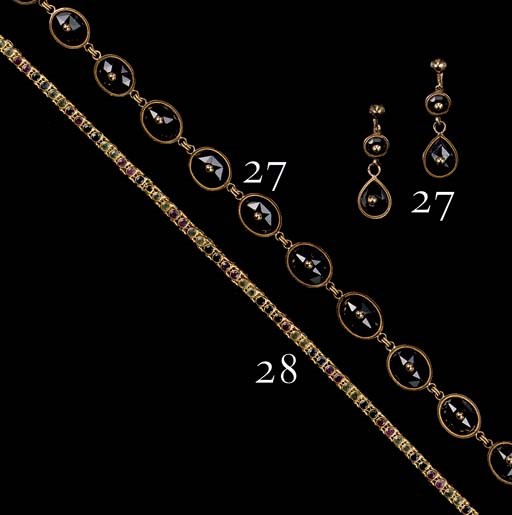 A SAPPHIRE SET SNAKE NECKLACE