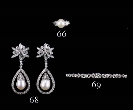 A CULTURED PEARL AND DIAMOND RING