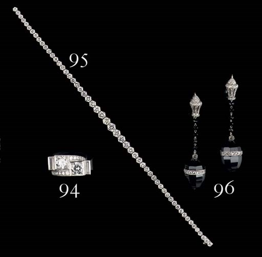 A PAIR OF BELLE EPOQUE ONYX AND DIAMOND EAR PENDANTS