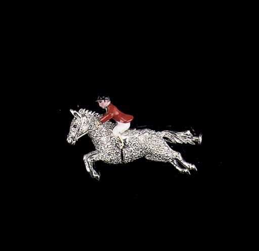 A DIAMOND AND ENAMEL JOCKEY BROOCH