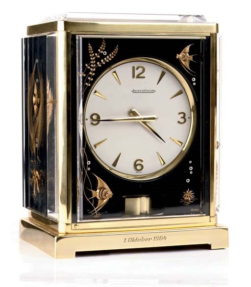 A BRASS AND PLEXIGLASS ATMOS CLOCK, BY JAEGER-LECOULTRE