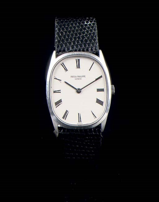 AN 18K WHITE GOLD OVAL WRISTWATCH, BY PATEK PHILIPPE
