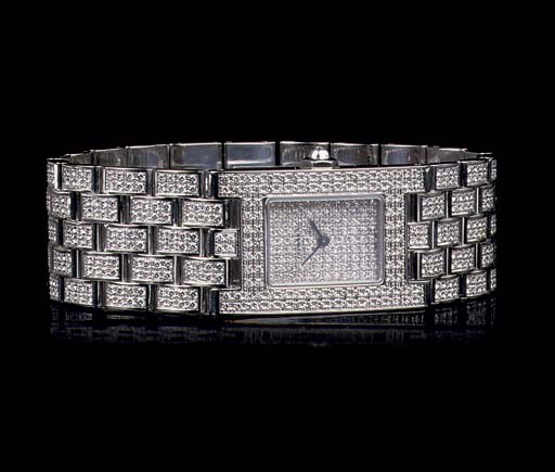 AN 18K WHITE GOLD AND DIAMOND WRISTWATCH, BY CHAUMET