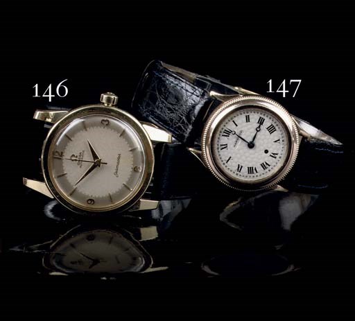 A 14K GOLD AUTOMATIC WATER RESISTANT WIRISTWATCH WITH SWEEP CENTRE SECONDS, BY OMEGA