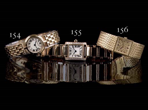 A LADY'S 18K GOLD WRISTWATCH, BY CARTIER