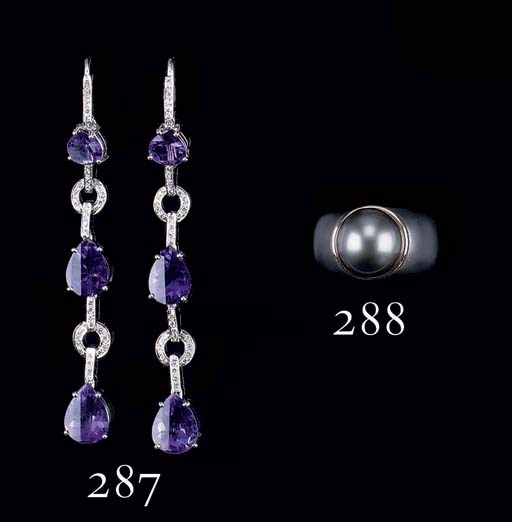 A PAIR OF AMETHYST AND DIAMOND EARRINGS