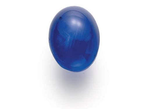 AN UNMOUNTED OVAL CABOCHON STAR SAPPHIRE