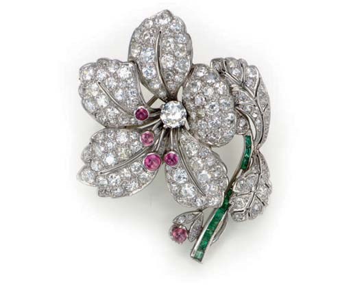 A DIAMOND, RUBY, EMERALD AND PLATINUM BROOCH