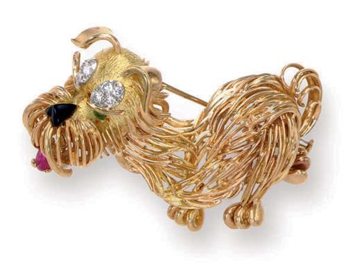 A MULTI-GEM AND GOLD DOG BROOCH