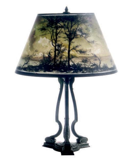 AN AMERICAN REVERSE PAINTED GLASS AND LACQUERED METAL TABLE LAMP,