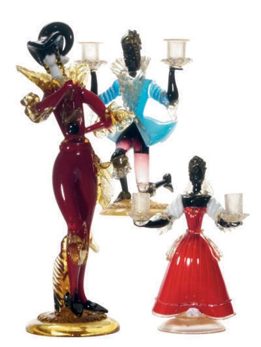 THREE ITALIAN GLASS FIGURAL CANDLESTICKS AND FIGURE OF A HARLEQUIN,