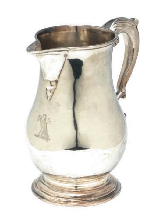 A GEORGE III SILVER BEER PITCHER,