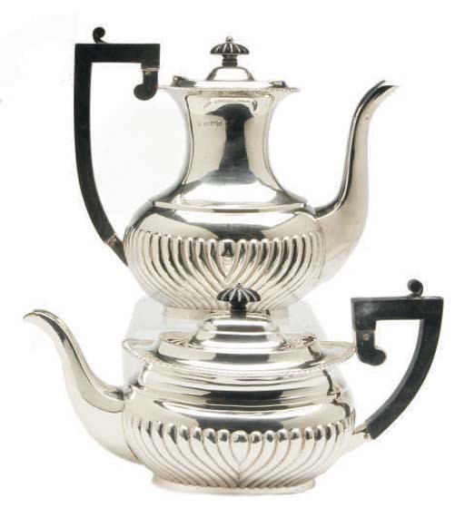 A VICTORIAN SILVER FOUR-PIECE PIECE TEA AND COFFEE SERVICE,