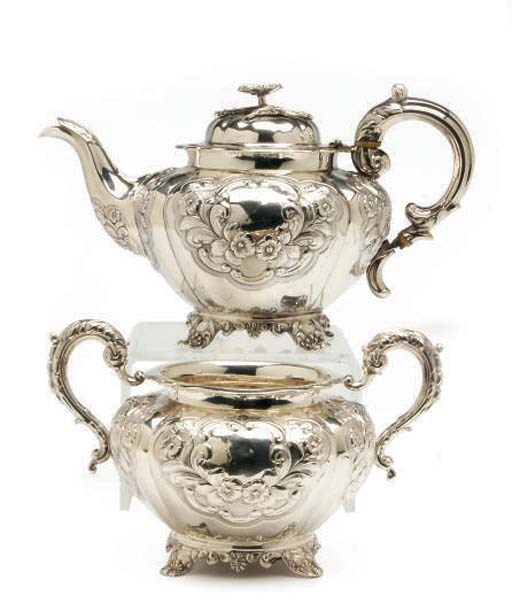 A VICTORIAN SILVER TEAPOT WITH HINGED COVER AND SUGAR BOWL**,