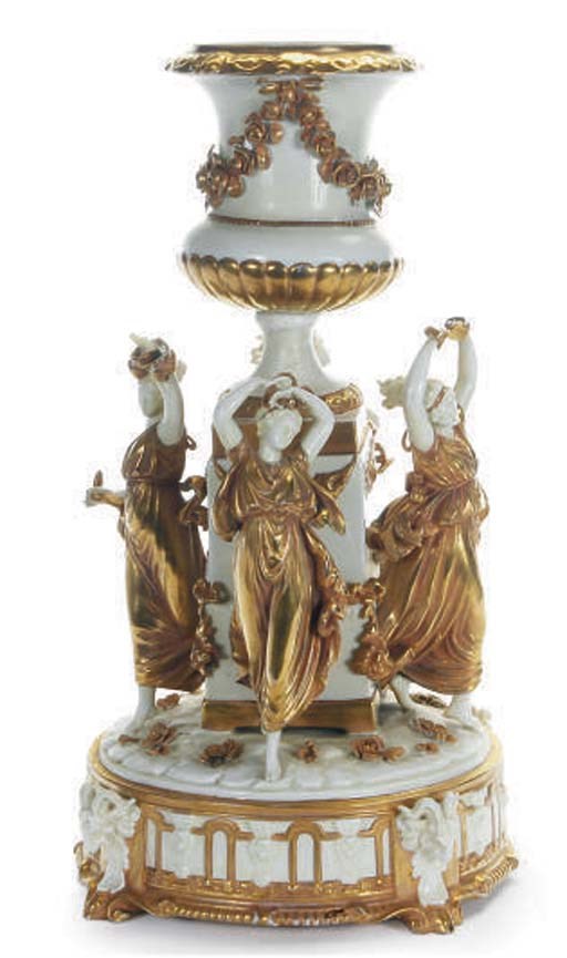 A CONTINENTAL PORCELAIN CAPODIMONTE STYLE GILT WHITE CENTERPIECE OF THE 'DANCING HOURS,'