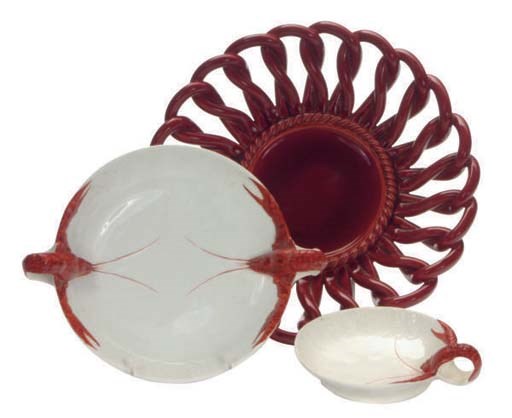 A FAIENCE PART SHELLFISH SERVICE, THREE FAIENCE BASKETS, AND JARDINIÈRE,