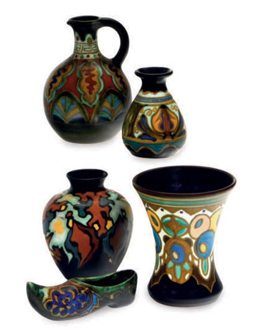 A GROUP OF DUTCH EIGHT CERAMIC VASES AND A MODEL OF A SHOE,