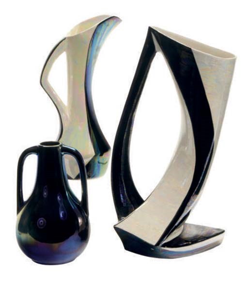 A GROUP OF EIGHT CONTINENTAL IRRIDESCENT-GLAZED TABLEWARES,