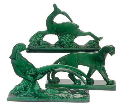 FOUR FRENCH GREEN-GLAZED EARTHEWARE FIGURES OF ANIMALS,