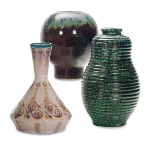 A GROUP OF FRENCH GLAZED EARTHENWARE VASES AND A VIDE POCHE,