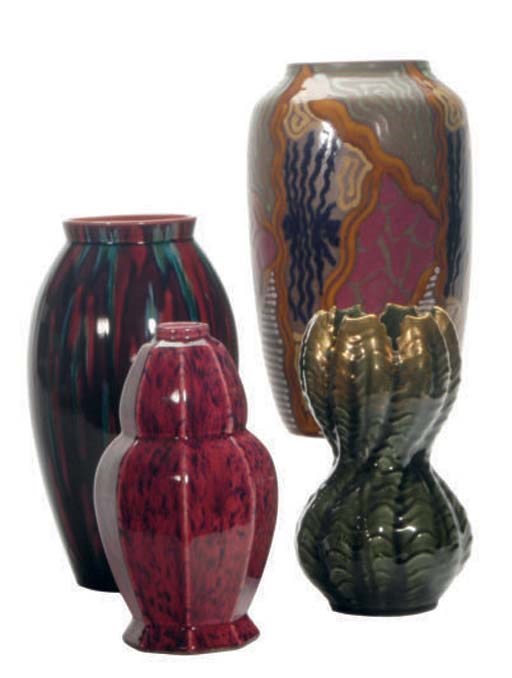 A GROUP OF EIGHT CONTINENTAL FAIENCE VASES,