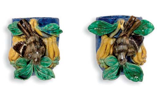 A PAIR OF CHINESE CERAMIC BIRD AND FINGER CITRON WALL POCKETS,