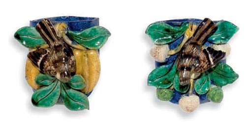 A PAIR OF CHINESE CERAMIC BIRD AND FRUIT WALL POCKETS,