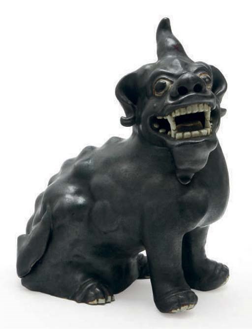 A CHINESE GREY-GLAZED POTTERY FIGURE OF A MYTHICAL BEAST,