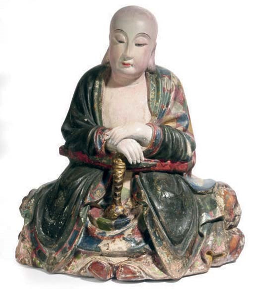 A CHINESE POTTERY MODEL OF A SEATED LUOHAN,