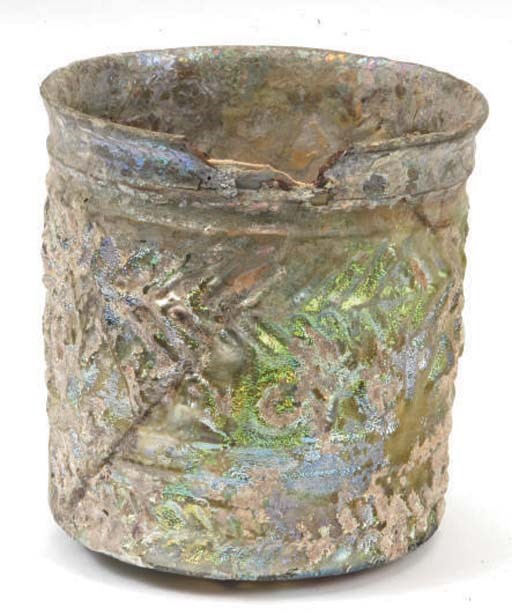 A ROMAN GLASS BEAKER,