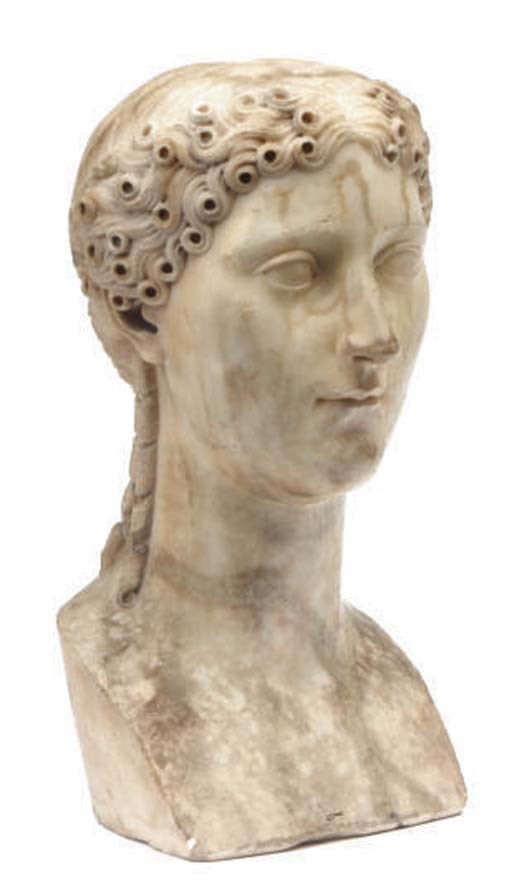 A ROMAN STYLE MARBLE BUST OF A WOMAN