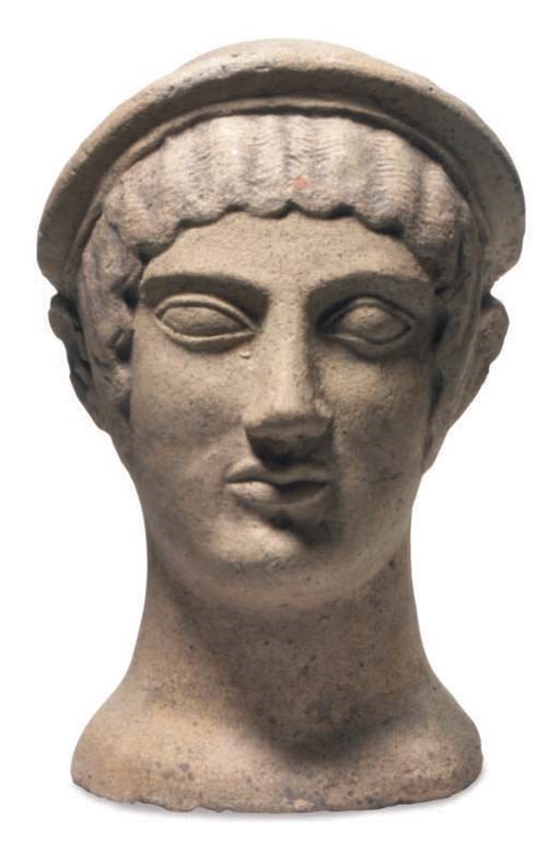 AN ETRUSCAN TERRACOTTA VOTIVE HEAD,