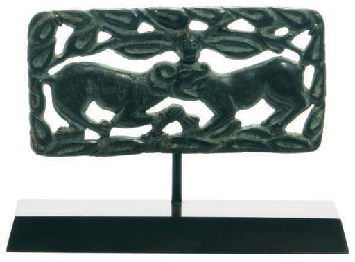 AN ORDOS BRONZE OPENWORK PLAQUE,
