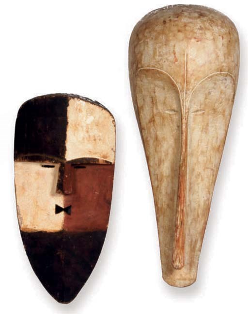 A GROUP OF FIVE AFIRCAN STYLE DECORATIVE MASKS,