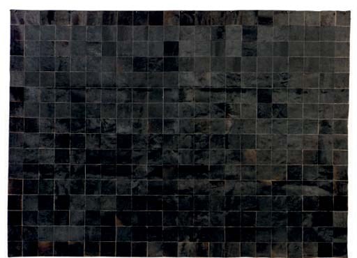 A PONY SKIN CARPET,