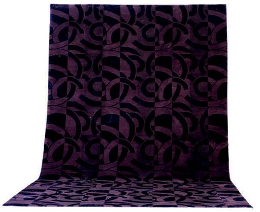 A SILK AND WOOL ART DECO STYLE CARPET