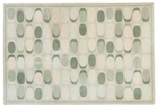 A MACHINE MADE ART DECO STYLE CARPET,