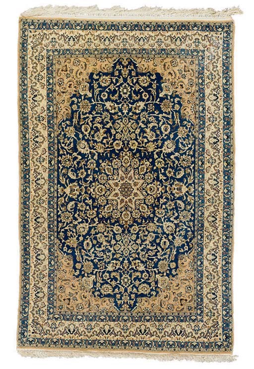 A NAIN RUG,