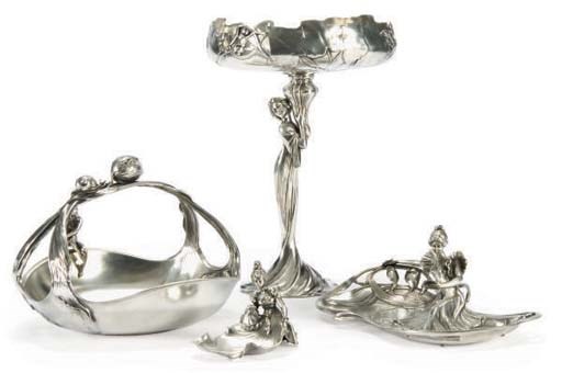 A GROUP OF CONTINENTAL PEWTER FIGURAL TABLE ITEMS,