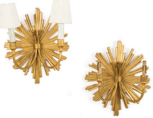 A PAIR OF GILT-METAL STARBURST FORM TWO-LIGHT WALL LIGHTS,