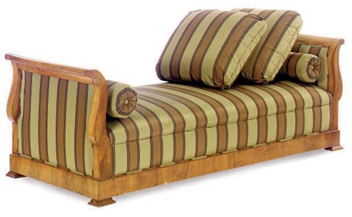 A CONTINENTAL WALNUT DAYBED UPHOLSTERED IN A STRIPED SILK,