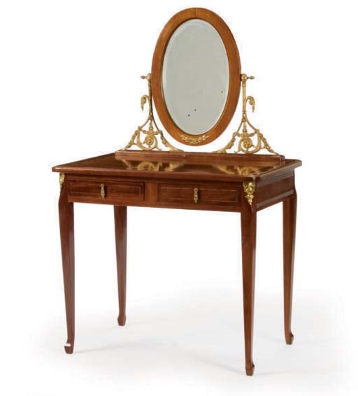 A FRENCH GILT-METAL MOUNTED WALNUT DRESSING TABLE WITH MIRROR,